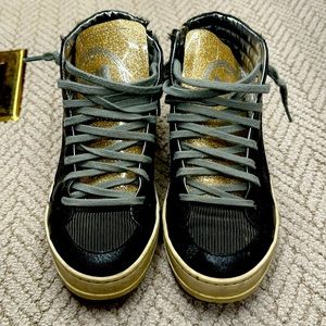 P448 black zip up high tops with sparkle gold tongue